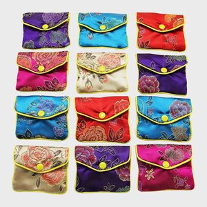 Colorful pouches display floral embroidery, arranged in a 3x4 grid, against a plain background.