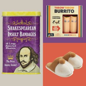 Bandage tin displays Shakespeare illustration; card game box shows dodgeball-themed design; fluffy slippers rest on orange surface.