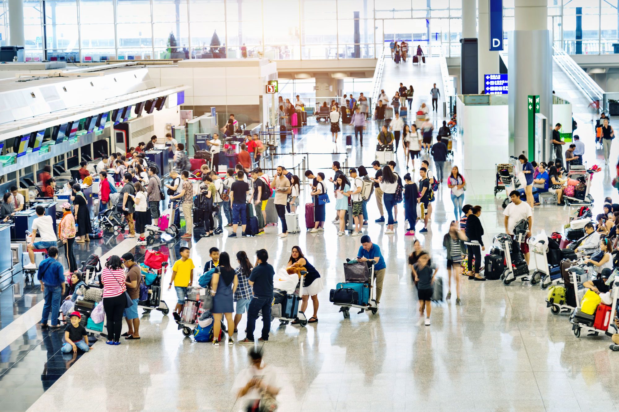 Crowd Of People Waiting For Check In