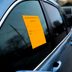 If You See an Orange Sticker on a Car, This Is What It Means