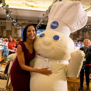 The Pillsbury Doughboy poses for a photo with Padma Lakshmi