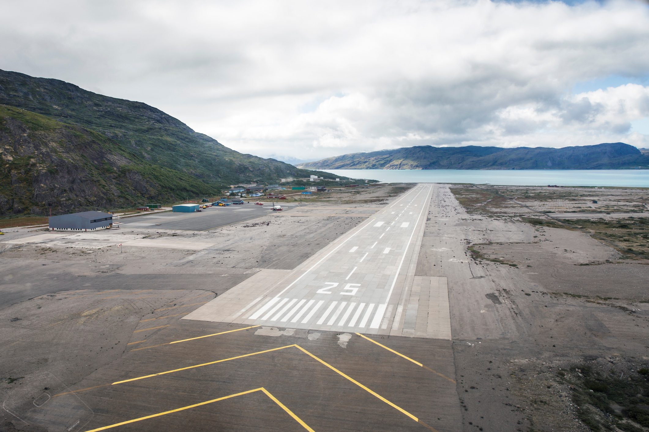 Airport in Narsarsuaq Greenland. Empty airstrip in fjord.