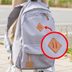 Here's the Real Purpose Behind Those Diamond Patches on Backpacks