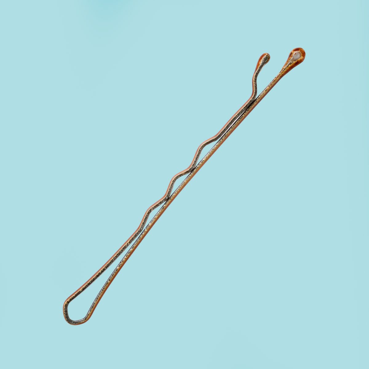 Here’s How Bobby Pins Really Got Their Name—And Whether There Was a Guy Named Bobby