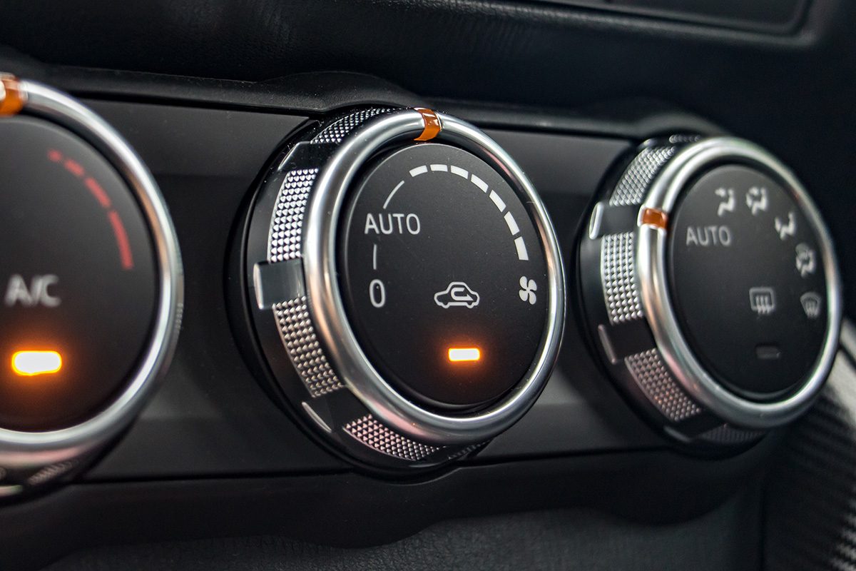 Air conditioning controls on the car dashboard. Close up car ventilation system, details of controls of modern car