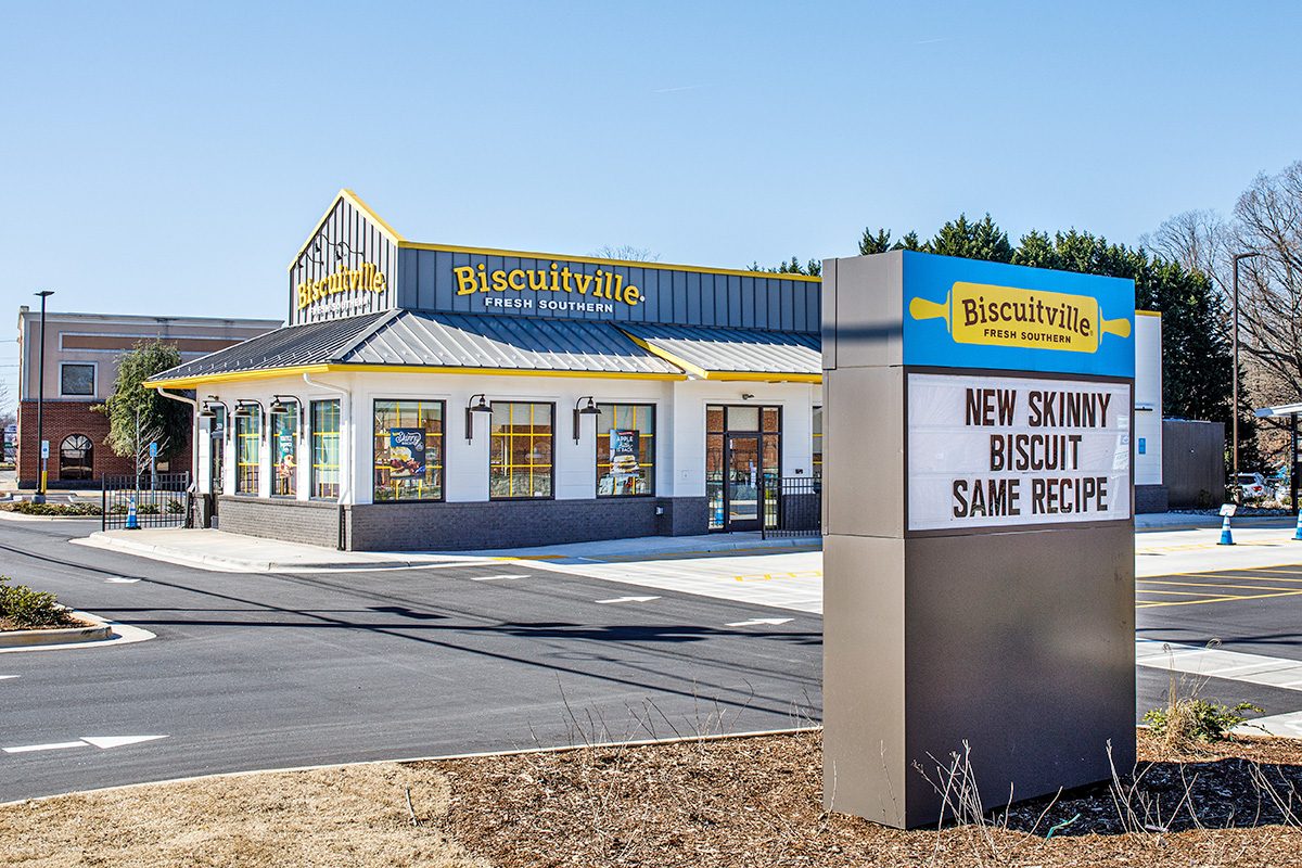 Biscuitville fast food restaurant, diagonal view with parking lot and drive-thru